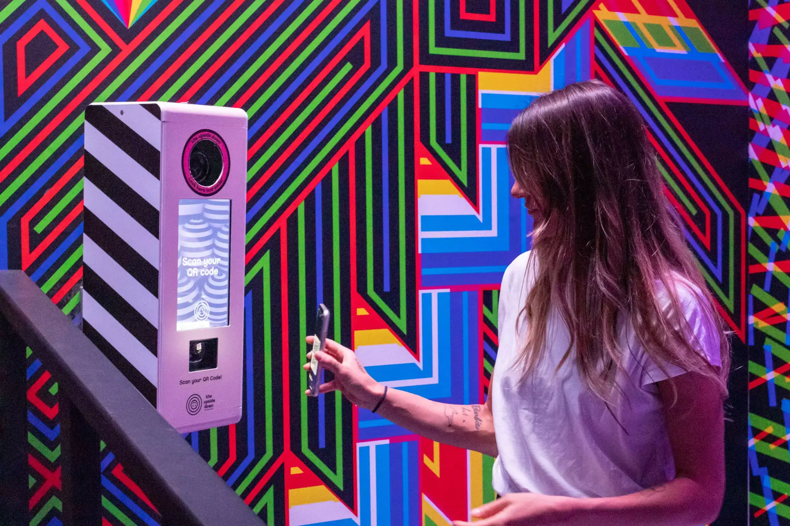 Colorful Scan & Capture photo booth with vibrant geometric patterns, designed for engaging and immersive guest experiences.
