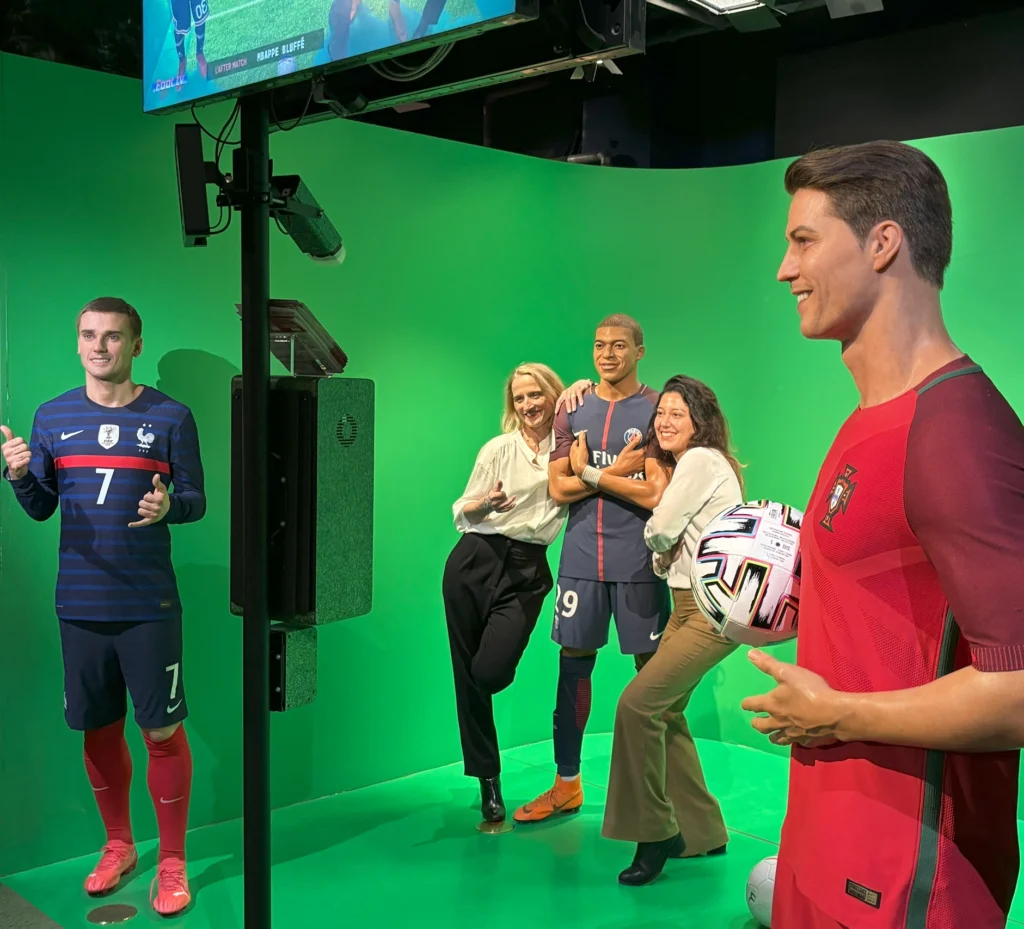 An interactive photo opportunity with guests posing next to ronaldo cristiano and griezman