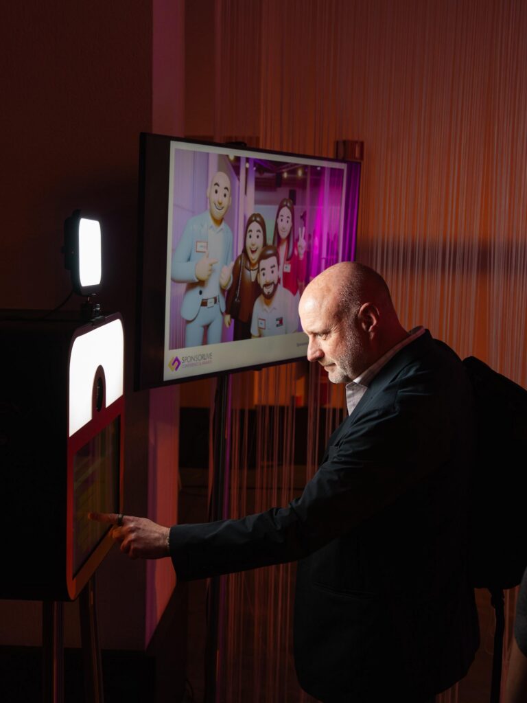 Attendee using an AI avatar generator at SponsorLive Conference and Awards
